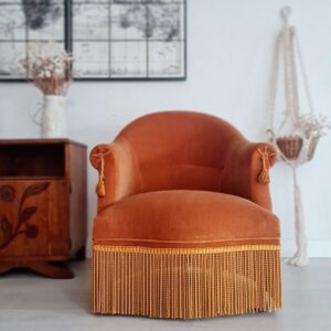 Fauteuil crapaud en velours doré