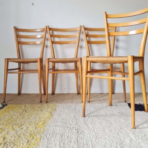 Lot de chaises vintage en bois et paille de style Baumann